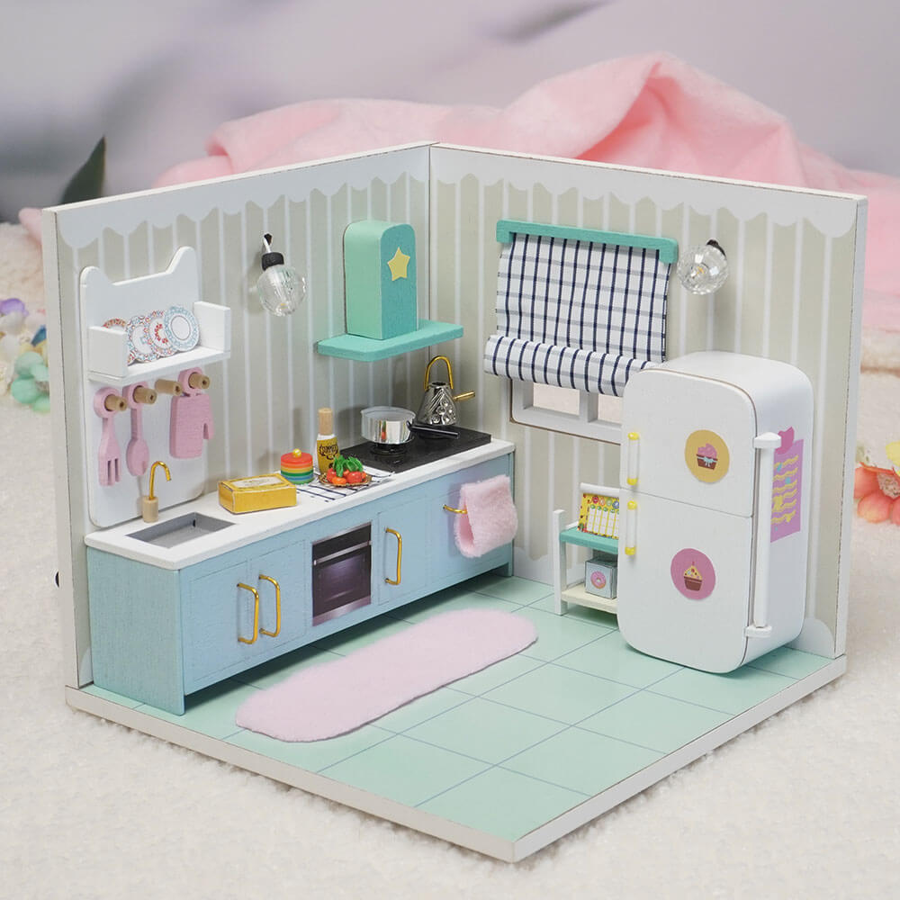 Una imagen de una casita en miniatura montada concretamente el modelo de la cocina de momo