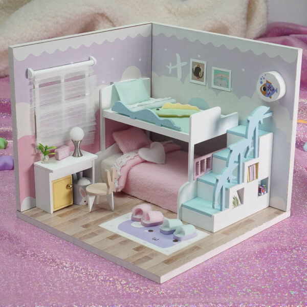 Una imagen de una casita en miniatura concretamente la de el modelo de las literas de momo de la colección la casita de momo